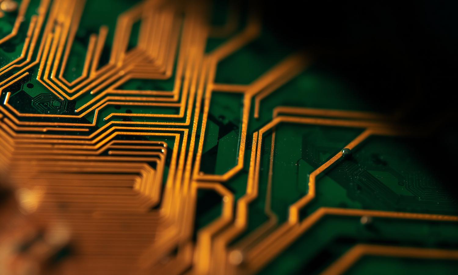 Macro photograph of copper traces on a printed circuit board